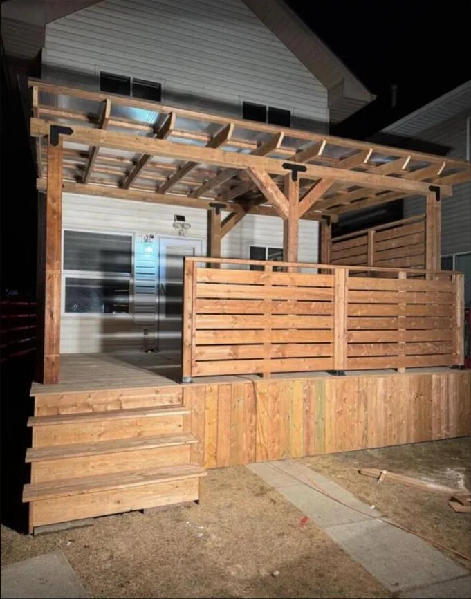 Deck and pergola with lighting, built by Apex Exterior Works
